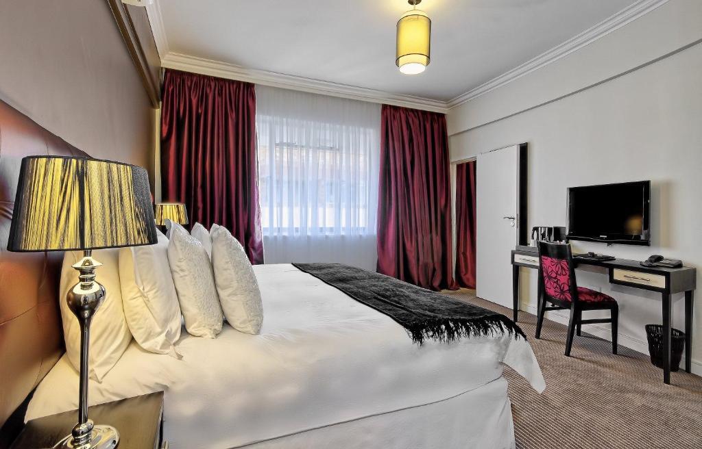 Ascot Boutique Hotel Йоханесбург Стая снимка